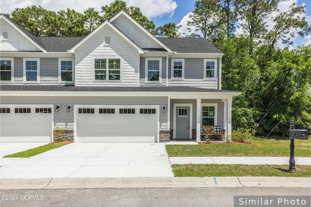 view of front of home with a garage