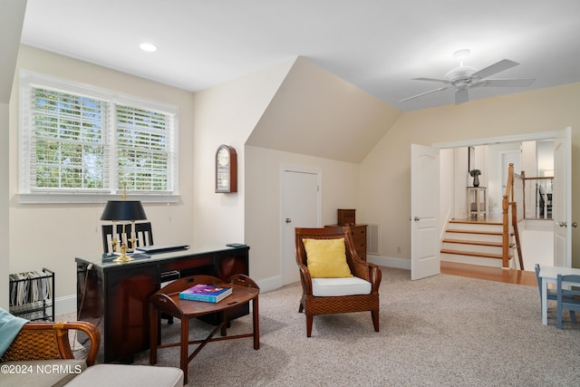 sitting room featuring carpet floors, ceiling fan, and lofted ceiling