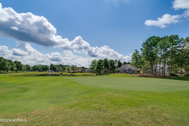 surrounding community featuring a yard