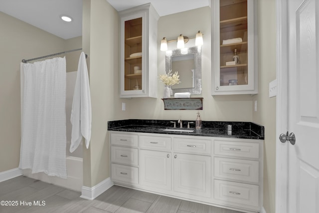 204 Van Riggs Rd, Hubert, NC 28539 - full bathroom featuring vanity and shower / bathtub combination with curtain