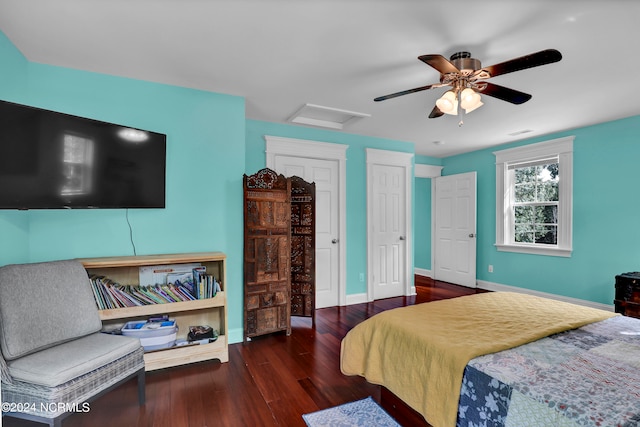 bedroom with ceiling fan and dark hardwood / wood-style floors