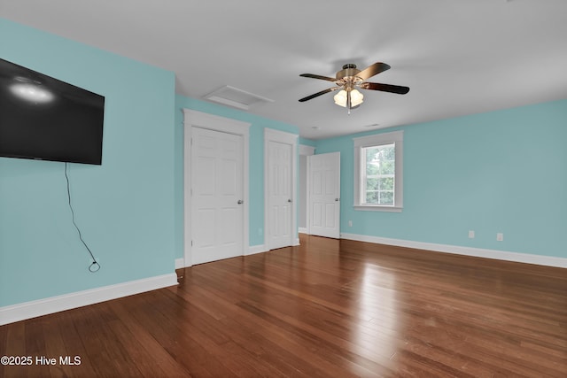 204 Van Riggs Rd, Hubert, NC 28539 - unfurnished bedroom featuring attic access, hardwood / wood-style floors, and a ceiling fan