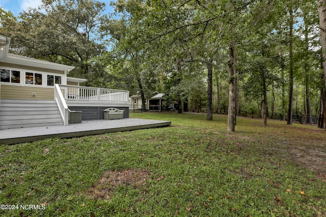 view of yard featuring a wooden deck