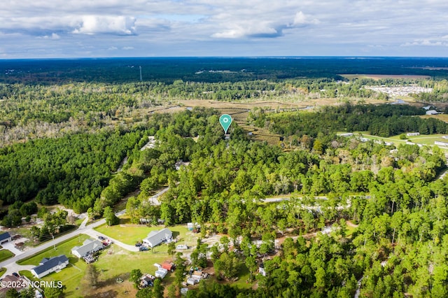 aerial view with a wooded view