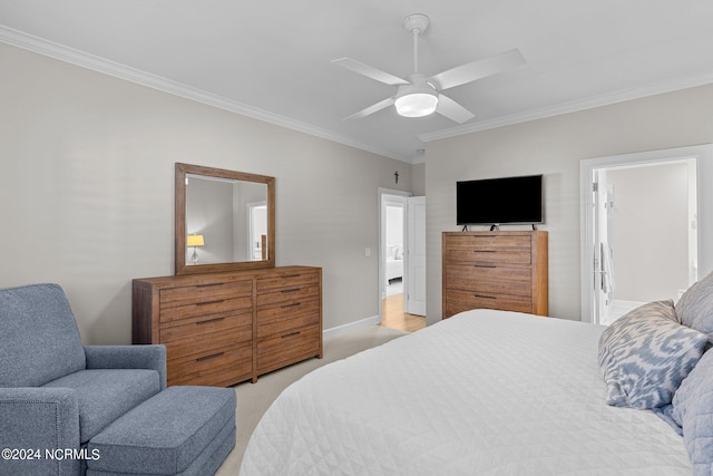 bedroom with ceiling fan, light colored carpet, ensuite bath, and crown molding