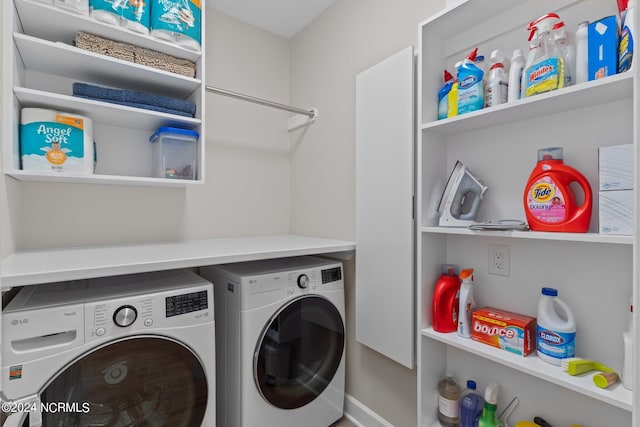 laundry room featuring washing machine and dryer