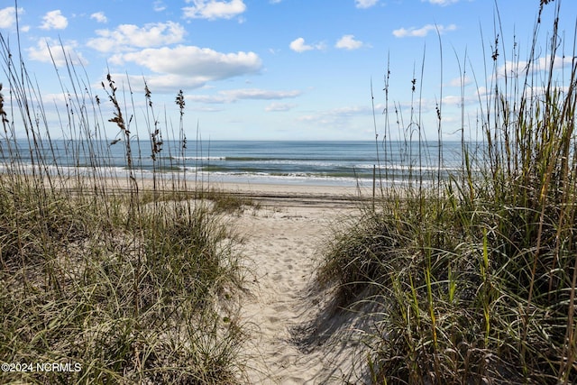 property view of water featuring a view of the beach