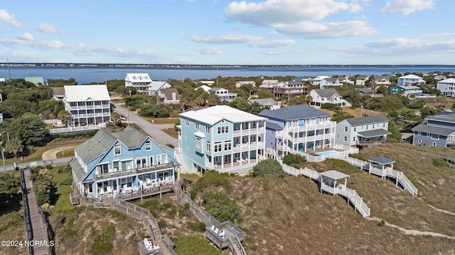 drone / aerial view featuring a water view