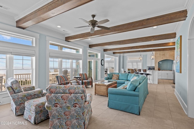 tiled living room featuring ornamental molding, beam ceiling, and ceiling fan