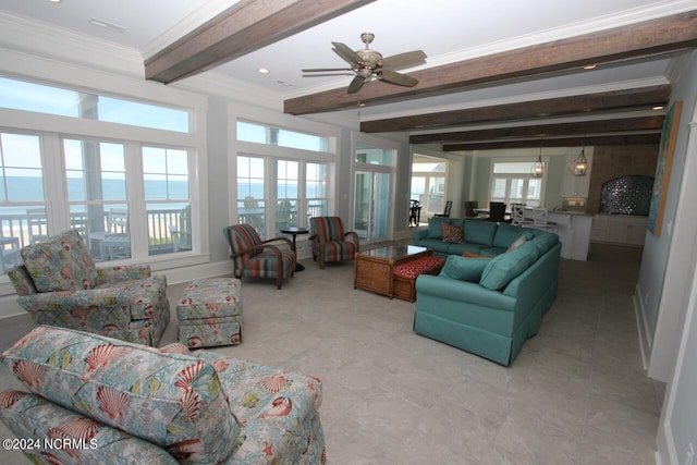 living room featuring a water view, beamed ceiling, ceiling fan, french doors, and ornamental molding