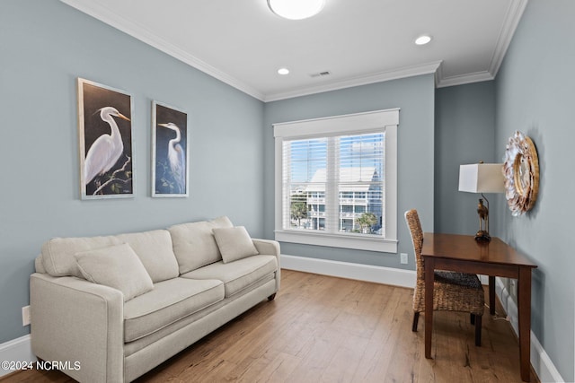 living room with ornamental molding and wood-type flooring