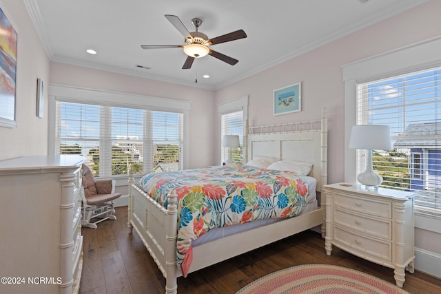 bedroom with ceiling fan, ornamental molding, dark hardwood / wood-style flooring, and multiple windows