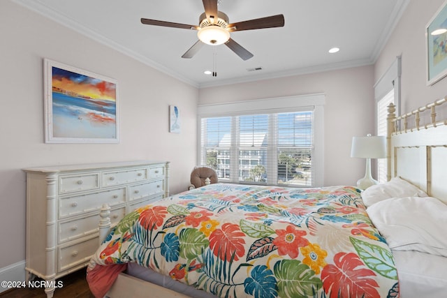 bedroom featuring ornamental molding, ceiling fan, and wood-type flooring