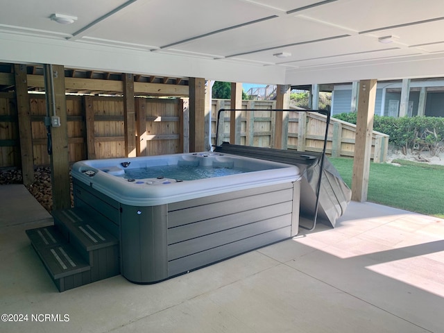 view of patio with a hot tub