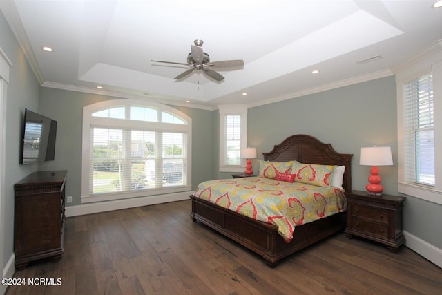 bedroom with ornamental molding, multiple windows, ceiling fan, and dark wood-type flooring