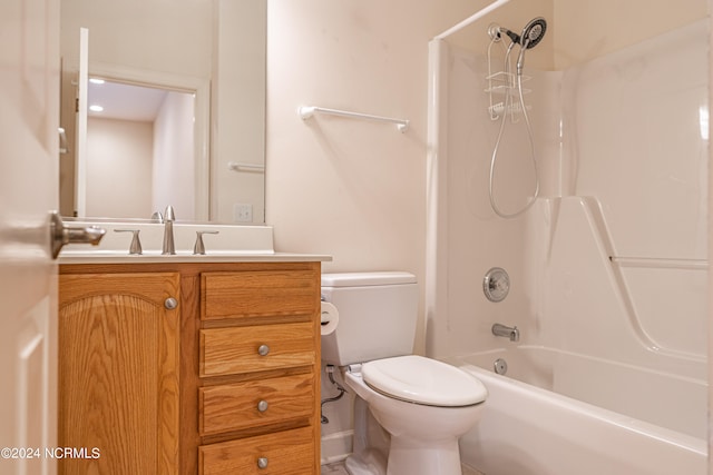 full bathroom with vanity, shower / bath combination, and toilet