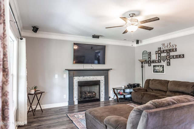 living room featuring ceiling fan, dark hardwood / wood-style floors, and crown molding