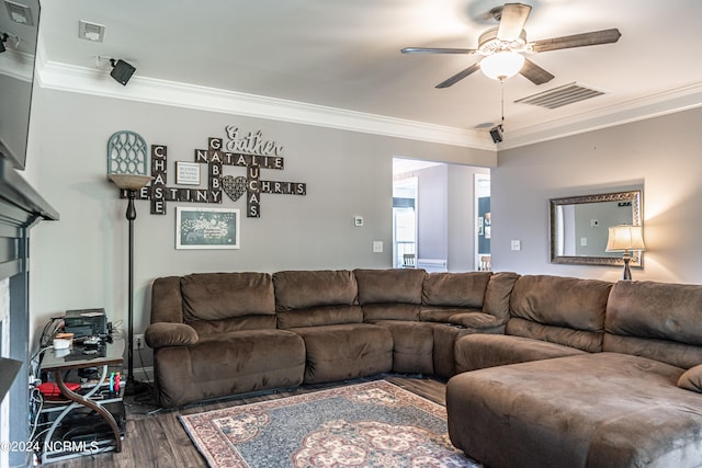 living room with ornamental molding, ceiling fan, and hardwood / wood-style flooring