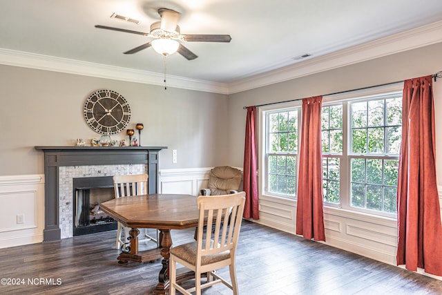 6 Eagle Dr, Foxfire Village, NC 27281 - dining area featuring a fireplace, ornamental molding, a ceiling fan, visible vents, and wood finished floors
