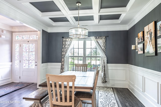 dining area featuring beamed ceiling, crown molding, dark hardwood / wood-style flooring, and a wealth of natural light