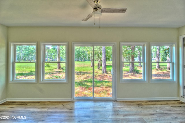 interior space with light hardwood / wood-style floors and ceiling fan