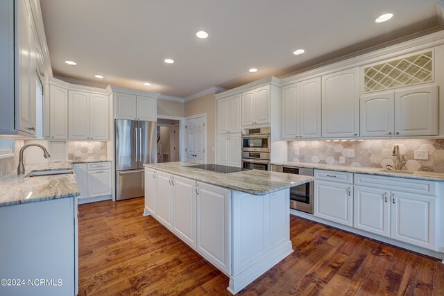 kitchen with white cabinetry and appliances with stainless steel finishes