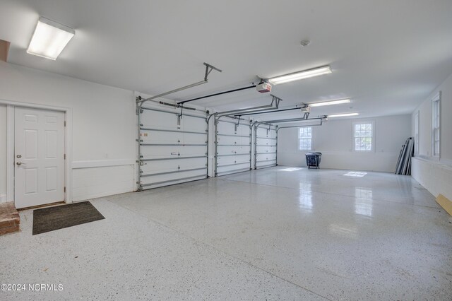 140 River Woods Dr, Wallace, NC 28466 - garage with a garage door opener