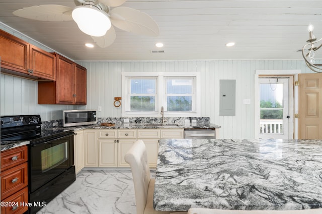 3016 W Beach Dr, Oak Island, NC 28465 - kitchen with stainless steel appliances, a sink, electric panel, light stone counters, and light marble finish floors