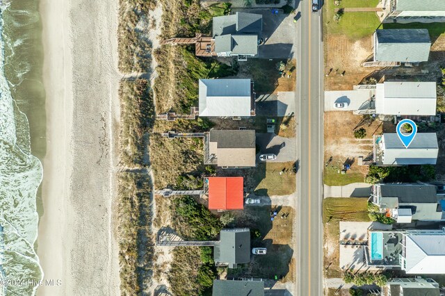 3016 W Beach Dr, Oak Island, NC 28465 - aerial view of property and surrounding area with nearby suburban area