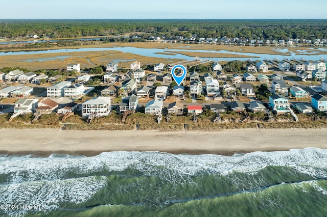 aerial view with a view of the beach and a water view