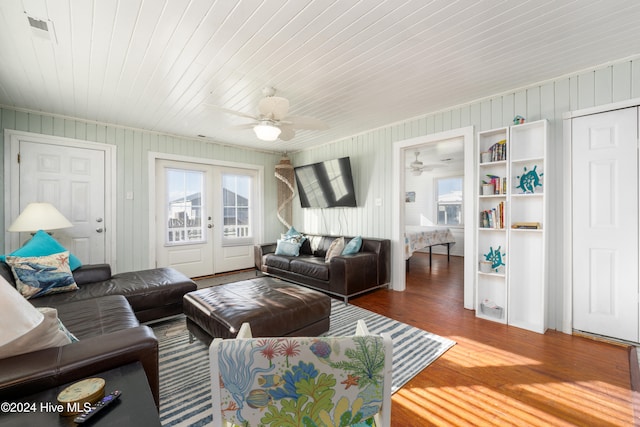 living room featuring wood ceiling, french doors, hardwood / wood-style flooring, and ceiling fan