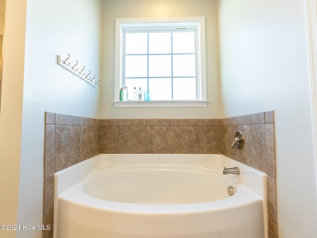 bathroom with a tub