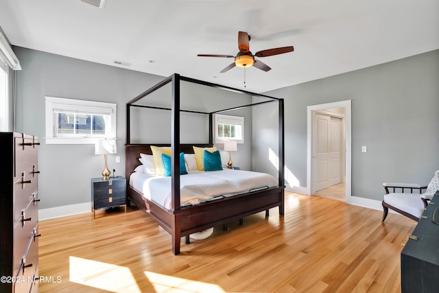 bedroom featuring ceiling fan and hardwood / wood-style flooring