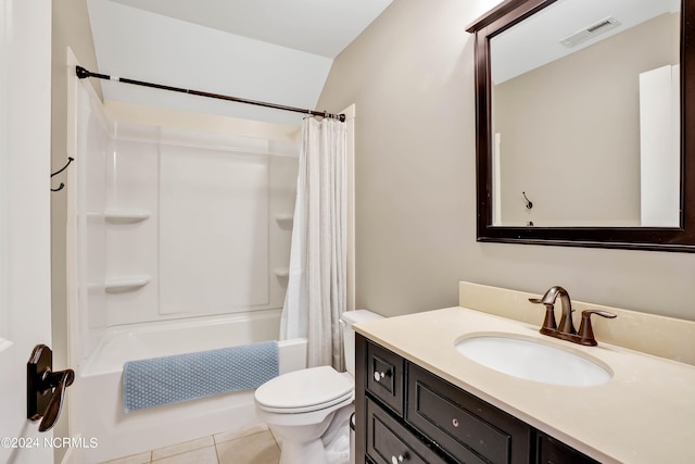 full bathroom featuring shower / bathtub combination with curtain, tile patterned floors, vanity, and toilet