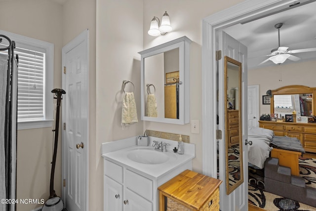 bathroom with vanity and ceiling fan