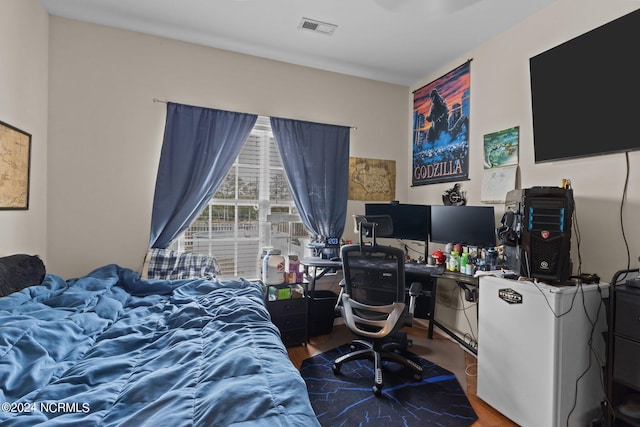 bedroom featuring wood-type flooring