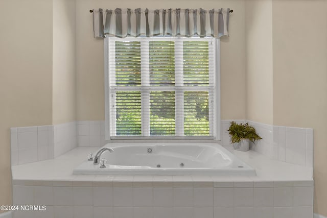 full bath with a jetted tub