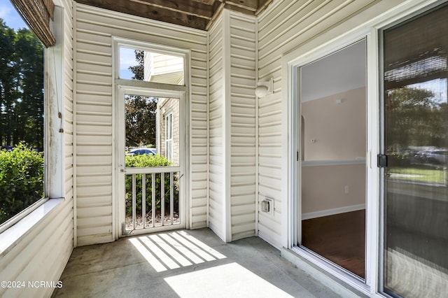 property entrance featuring covered porch