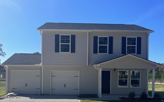 view of front property featuring a garage