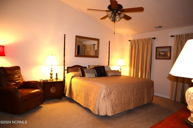 carpeted bedroom featuring ceiling fan and vaulted ceiling