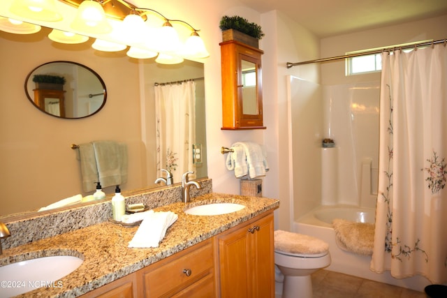 full bathroom with tile patterned flooring, toilet, shower / bath combo with shower curtain, and vanity