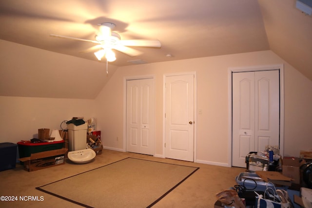 bonus room with ceiling fan and lofted ceiling