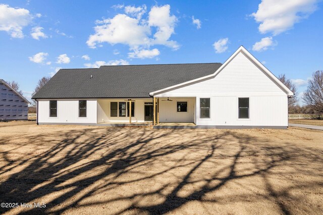 back of house with a patio area