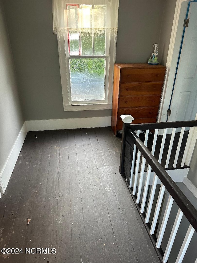 stairs with wood-type flooring