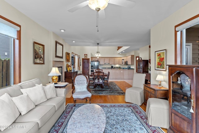 114 SW 21st St, Oak Island, NC 28465 - living room featuring a ceiling fan and light wood finished floors