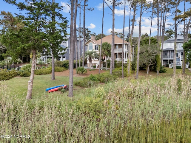114 SW 21st St, Oak Island, NC 28465 - view of community featuring a residential view