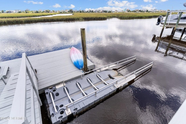 dock area featuring a water view