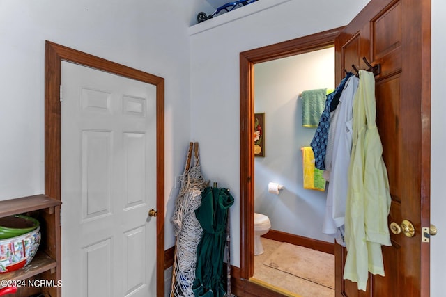 114 SW 21st St, Oak Island, NC 28465 - interior space with baseboards and toilet