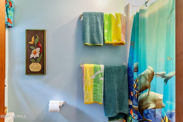 114 SW 21st St, Oak Island, NC 28465 - bathroom featuring toilet