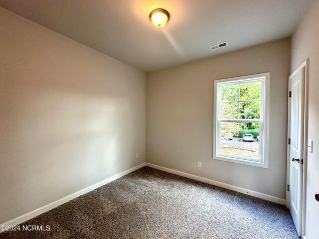 empty room featuring carpet